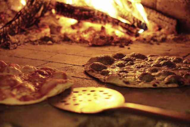 Projeto da pizzeria ComVida by In Bocca al Lupo.