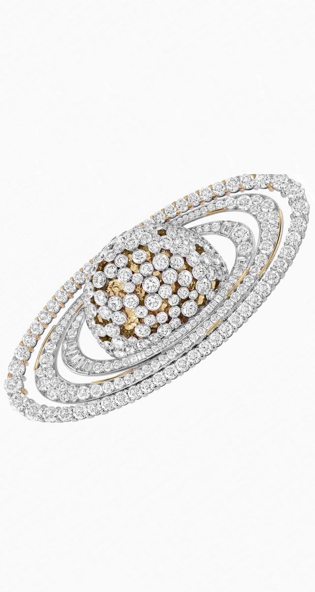 Alfinete Saturne em ouro branco com diamantes, coleção Sous les Étoiles, Van Cleef & Arpels