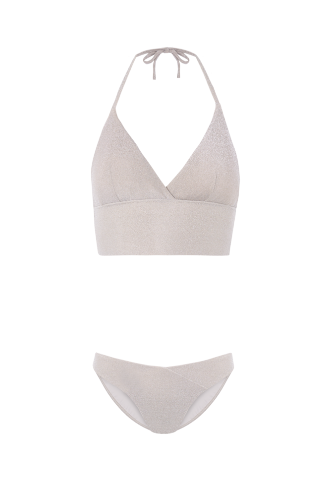 Tendência: Brilhos. Top de biquini, 8,99 €,Women’secret. Cueca de biquini, 5,99 €, Women’secret
