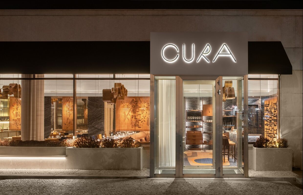 Entrada do restaurante 'Cura'.