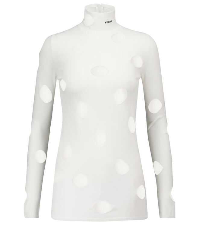 Camisola em malha, €950, Prada em Mytheresa.com