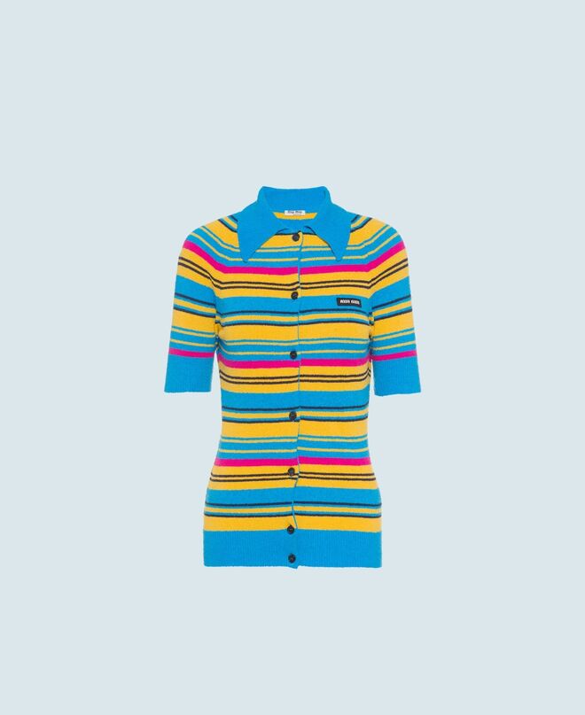 Cardigan em malha bouclé de lã, € 790, Miu Miu.