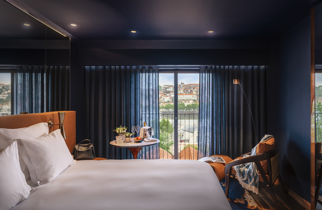 The Lodge Wine & Business Hotel: um quarto.
