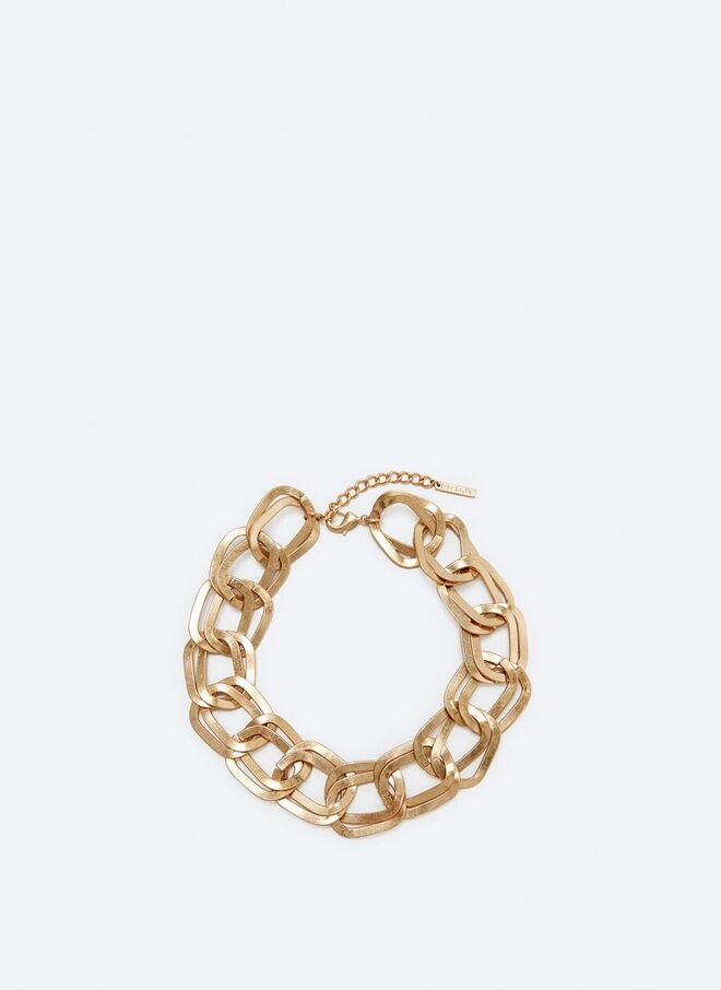 Colar em metal, €49, Uterqüe. 