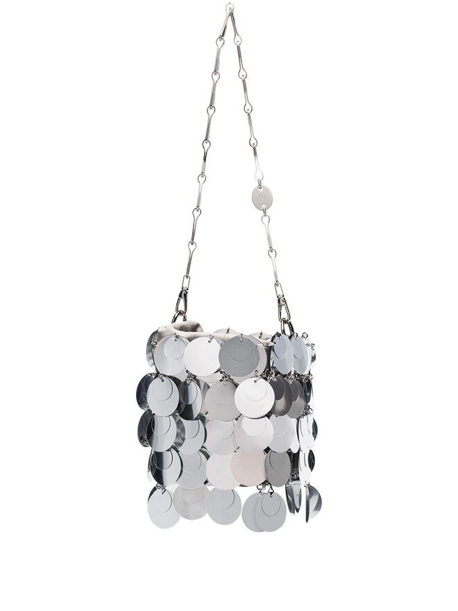 Carteira Sparkle Disc em metal, pvc e pele, €579, Paco Rabanne em Farfetch.com.