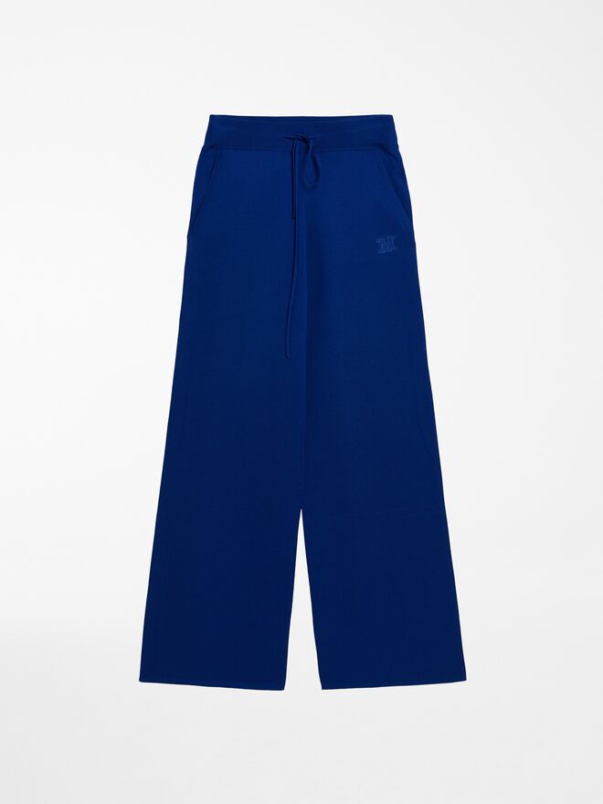 Calças em lã, €395, Max Mara