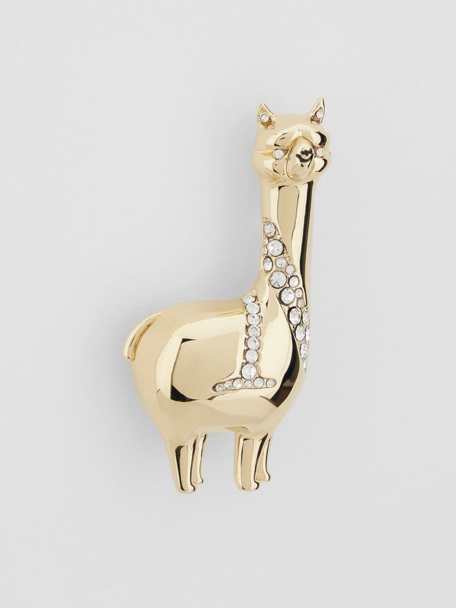 Mãe - Alfinete de peito em metal dourado com cristais, €99, Max Mara