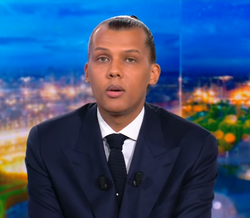 Cantor belga Stromae interrompe telejornal em direto