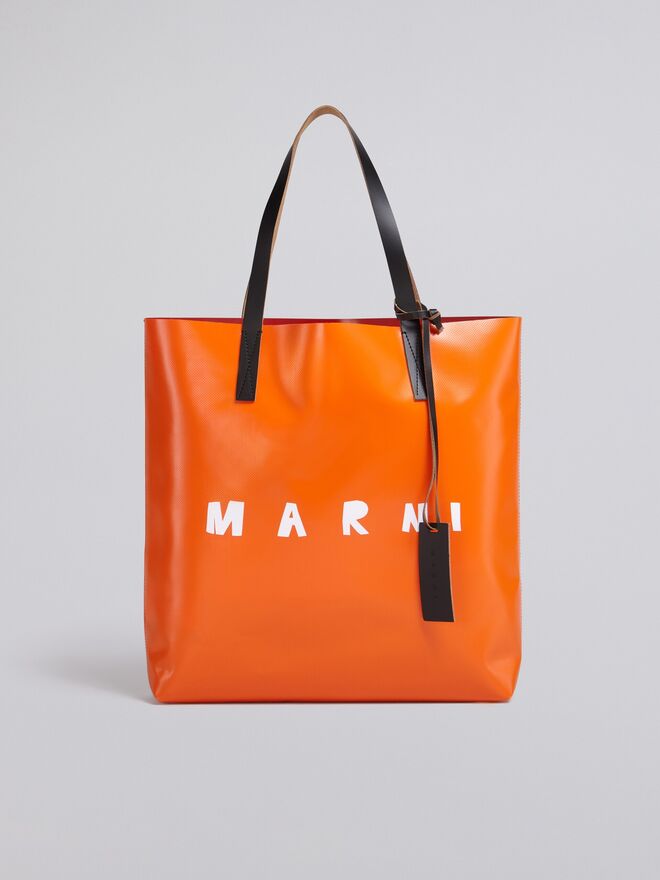 Carteira em pvc e pele, €320, Marni