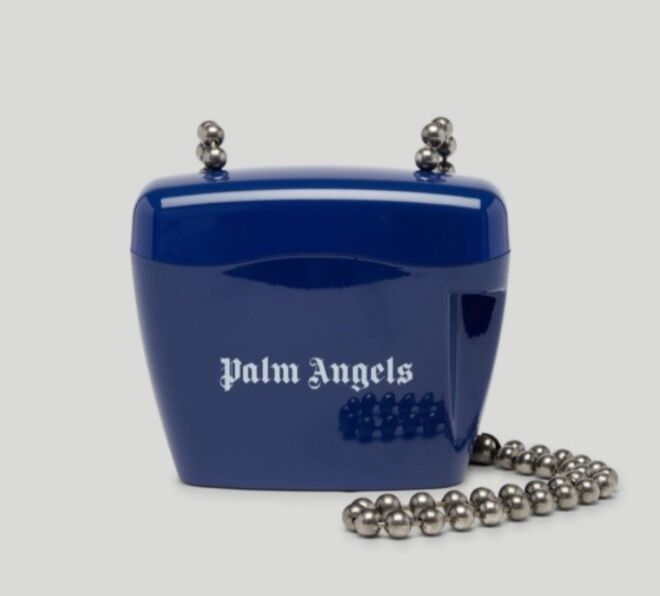 Carteira Padlock mini em PVC e metal, €295, Palm Angels