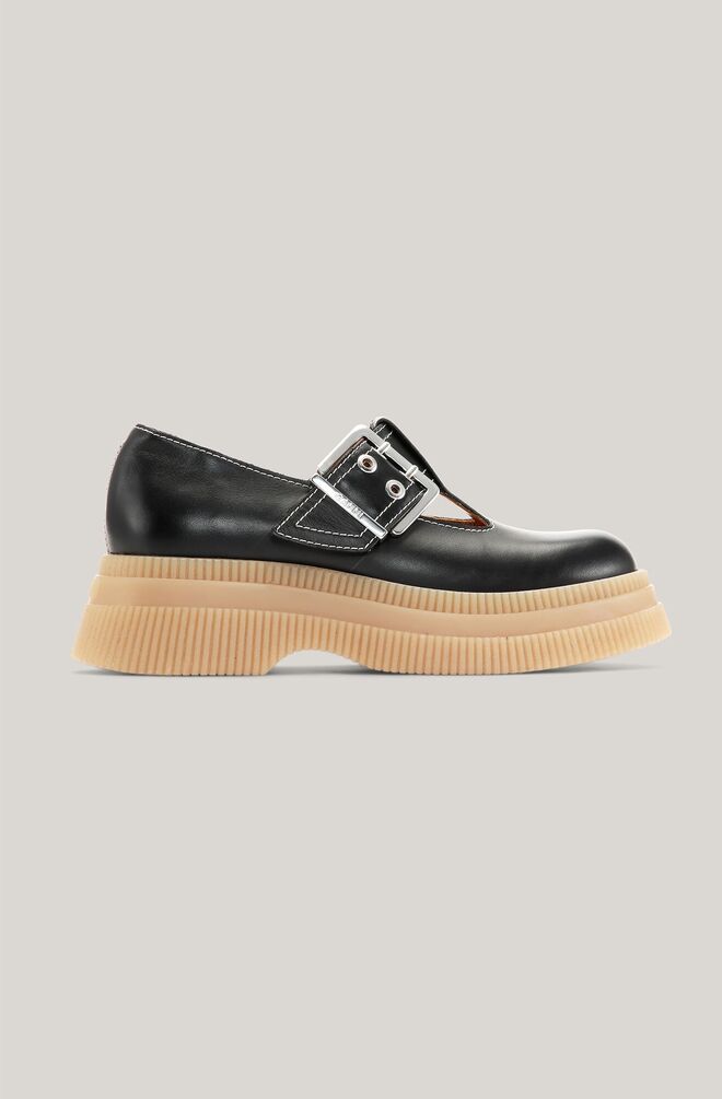 Loafers em pele e PVC, antes €325 agora €162, Ganni