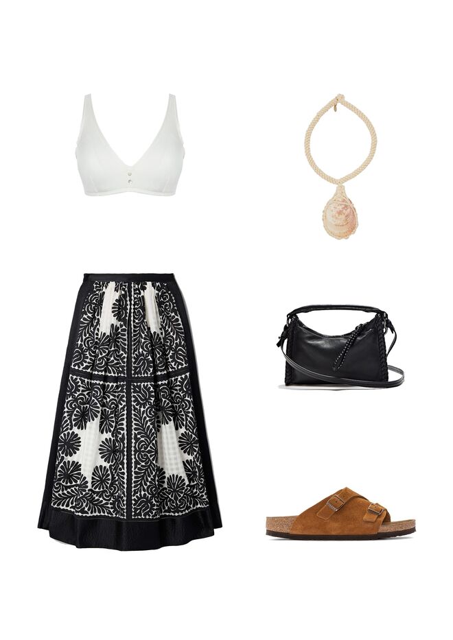 Look 3: Soutien em cetim e algodão, €29,99, Women’Secret; Saia Francesca em algodão, €805, Ulla Johnson em Netaporter.com; Colar Larry Shell em corda de algodão com concha, €620, Chloé em Farfetch.com; Carteira em pele, €69,95, Massimo Dutti; Sandálias Zürich em camurça e cortiça, €110, Birkenstock