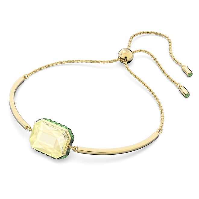 Pulseira Orbita em aço lacado a dourado com cristais Swarovski, €135, Swarovski