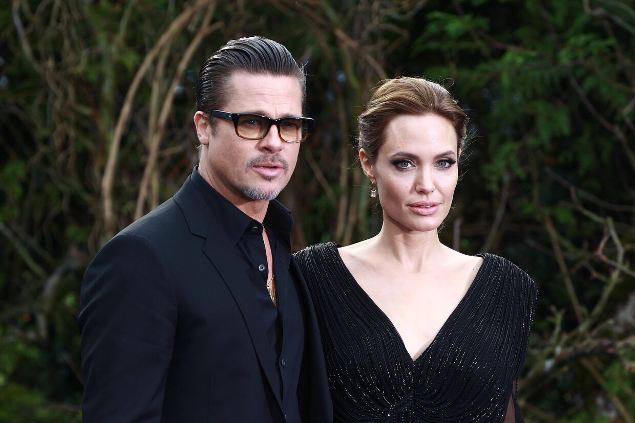 Brad Pitt e Angelina Jolie numa receção privada em Londres relacionada com o filme 'Maléfica', Maio de 2014