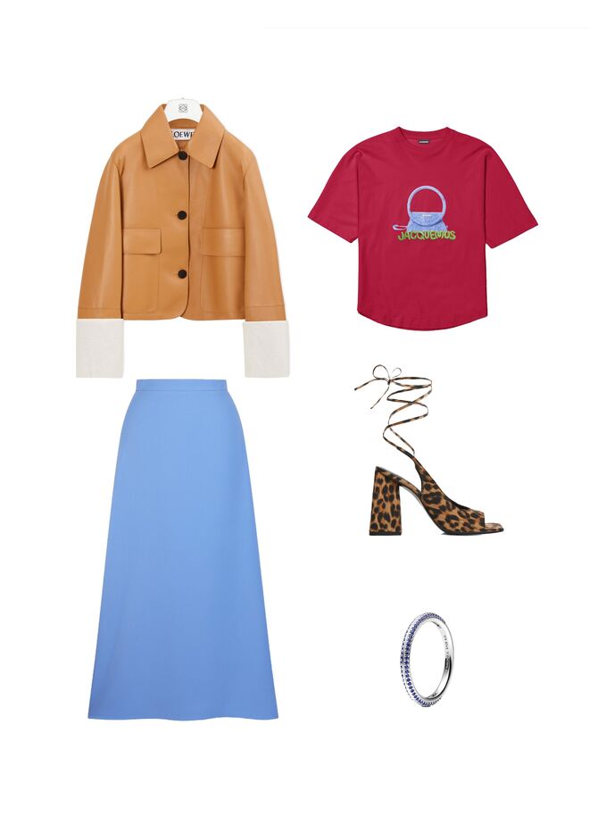 Casaco em pele, €2600, Loewe; T-shirt Sac Rond em algodão, €170, Jacquemus; Saia em crepe de seda, €230, Diogo Miranda; Sandálias em algodão, €69,99, Mango; Anel Pandora Me em prata 925 com cristais, €35, Pandora