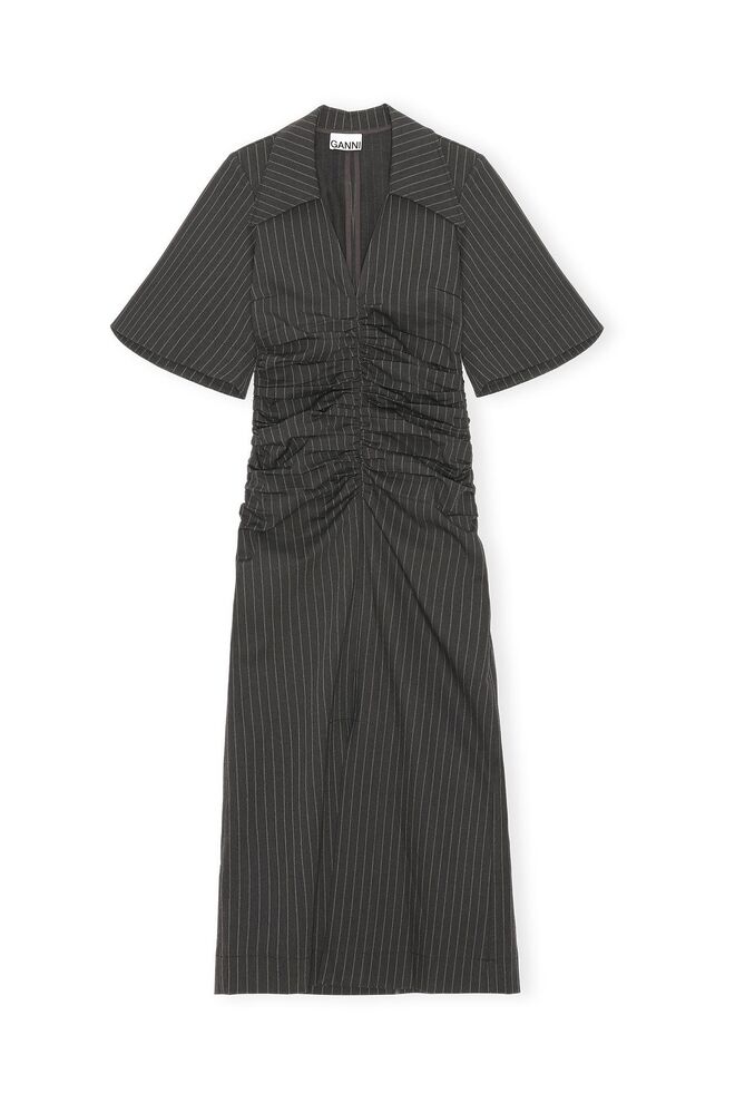 Vestido em lã, €345, Ganni