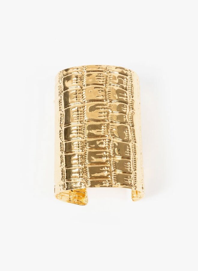 Pulseira em latão, €495, Dries Van Noten