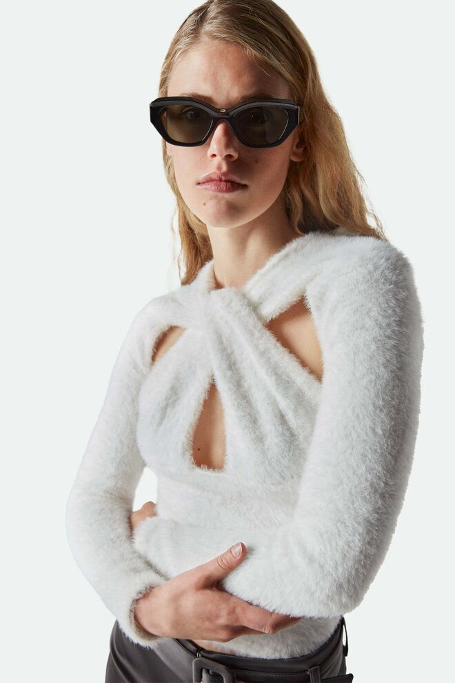 Camisola em malha, €390, Coperni