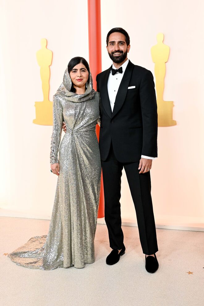 Malala Yousafzai e Asser Malik.