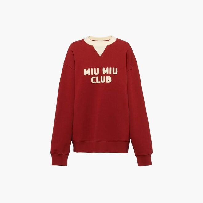 Camisola em felpa americana, €860, Miu Miu.