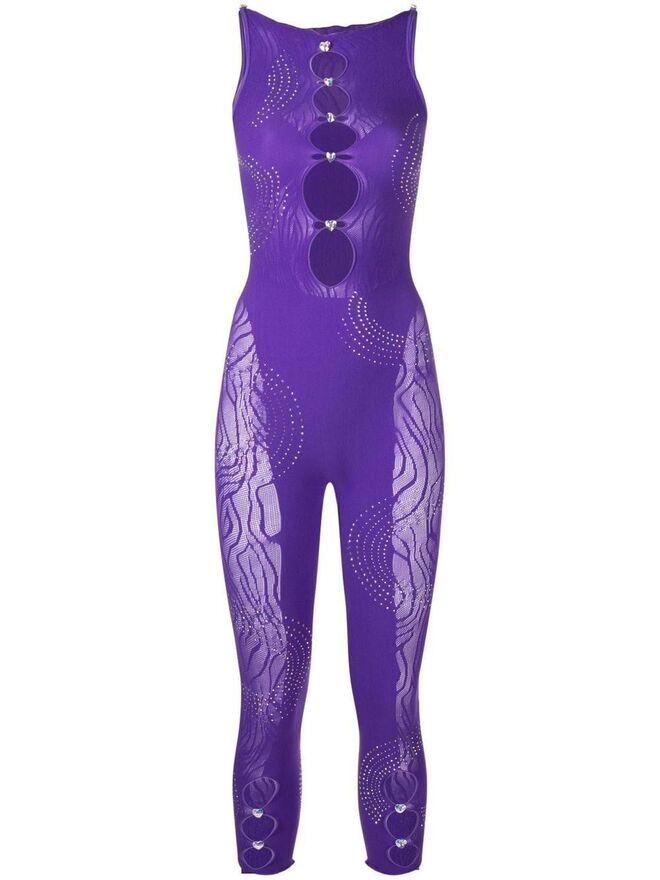 Macacão em nylon e renda, €300, Poster Girl em Farfetch.com.