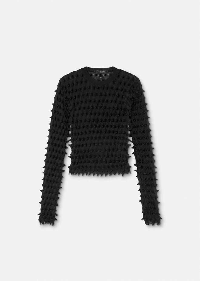 Camisola em malha de lã e algodão, €1750, Versace.