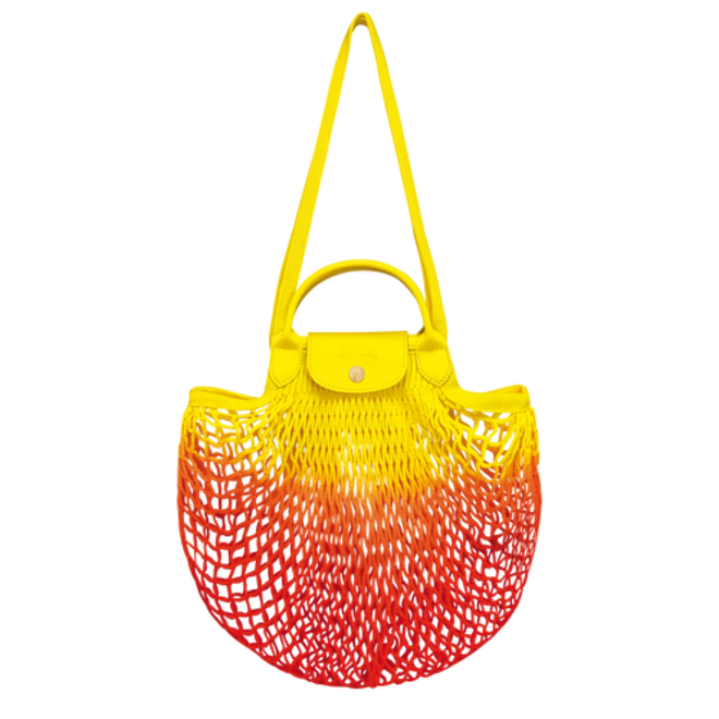 Carteira Le Pliage Filet L, em algodão e pele, €160, Longchamp.