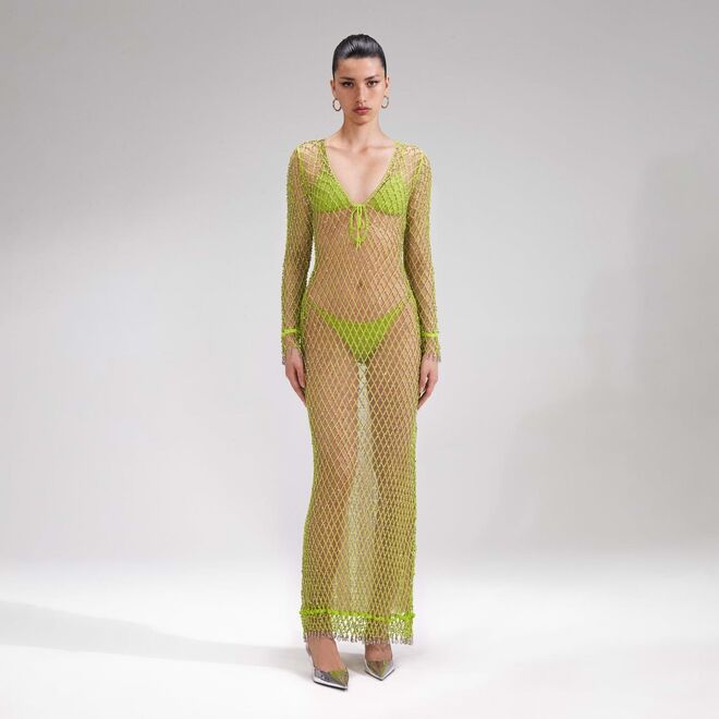 Vestido em rede com cristais aplicados, €565, Self Portrait .