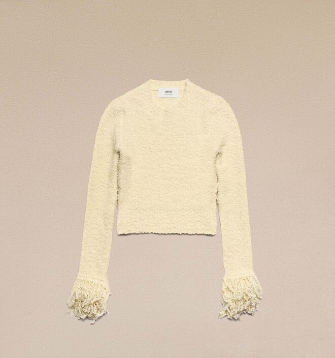 Camisola em lã, €480, Ami Paris.