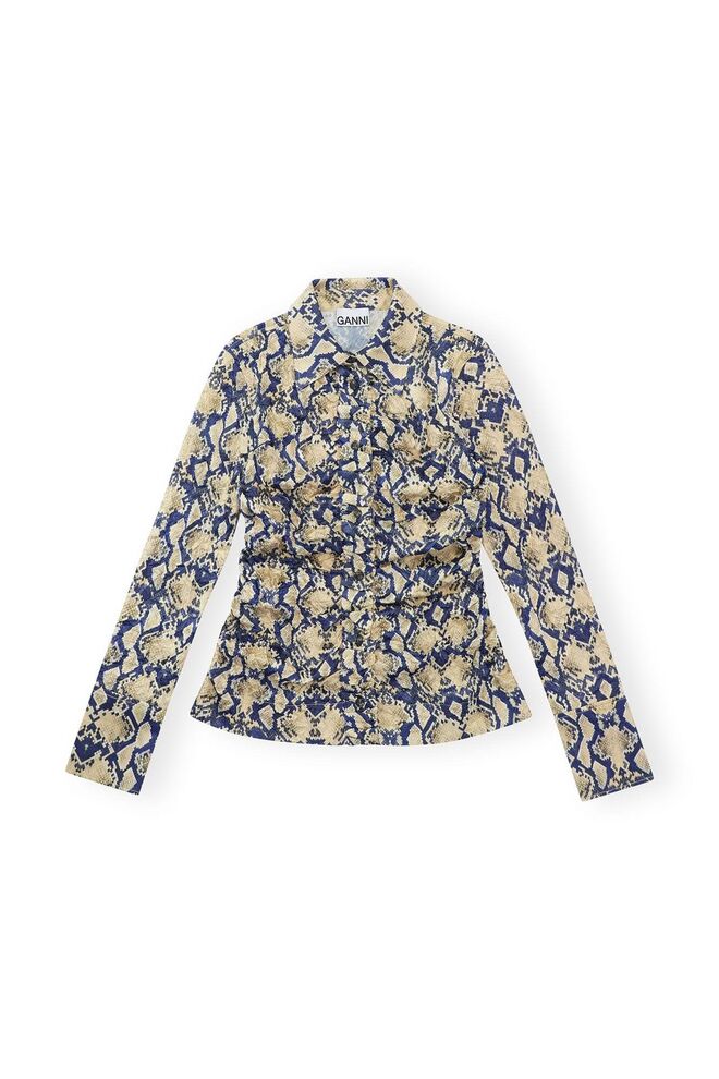 Camisa em em seda, €225, Ganni.