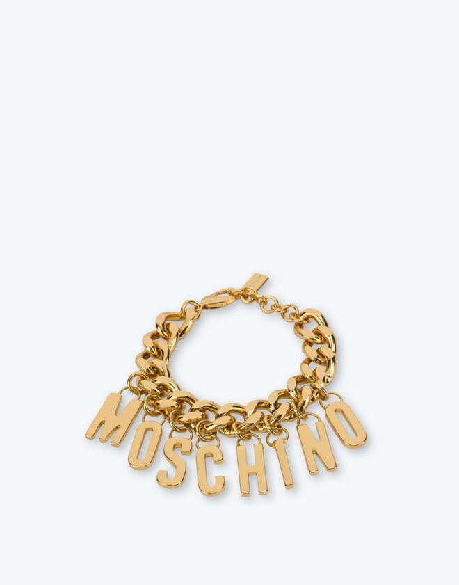 Pulseira em aço, €240, Moschino.