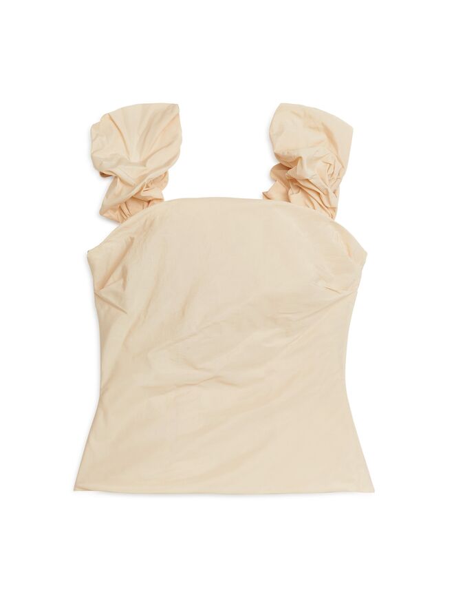 Top em tafetá, €79, Arket.
