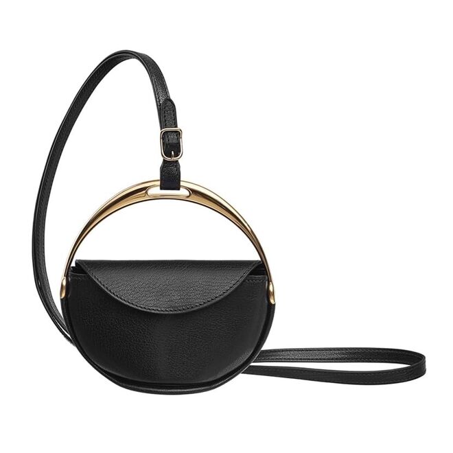 Clutch, Hermès (preço sob consulta).