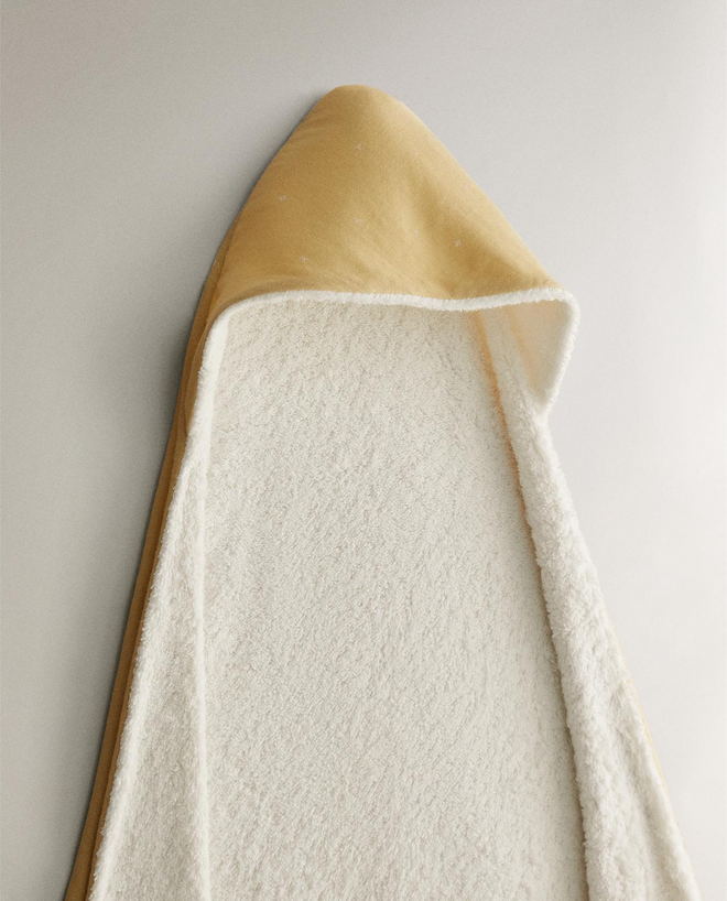 Capa de banho, €19,99, Zara Home.