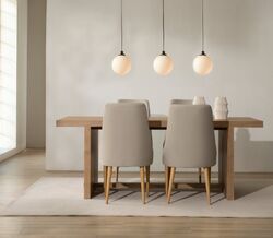 Sala de jantar renovada com mesa, cadeiras e iluminação moderna.
